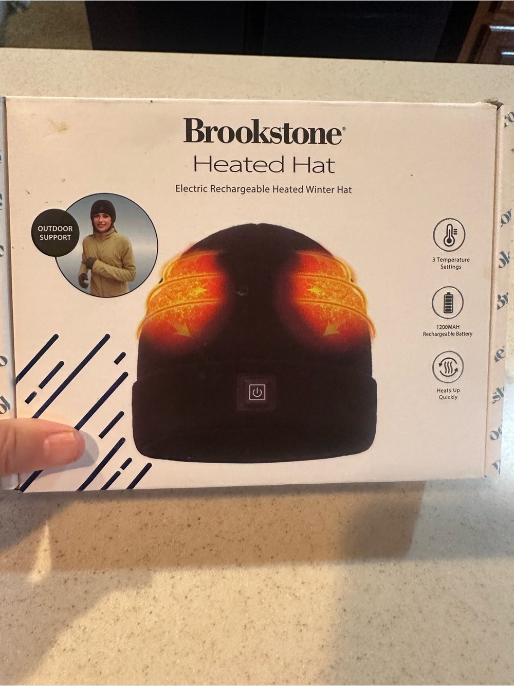 New Brookstone heated hat electric rechargeable heated winter hat. New in box